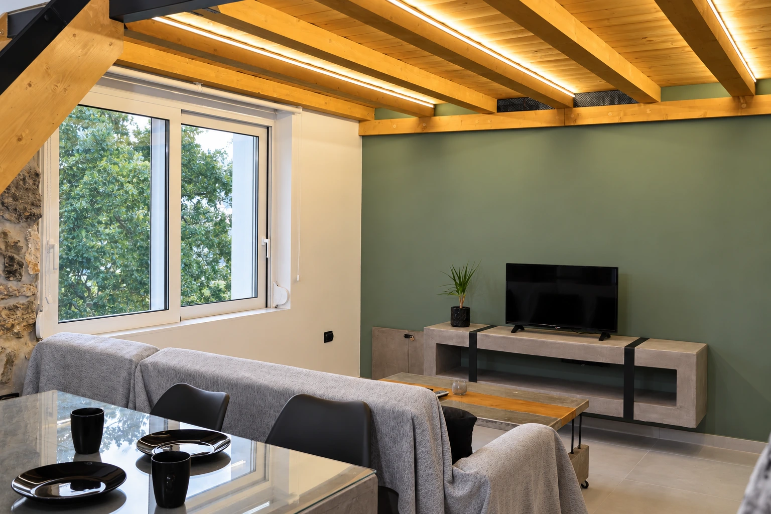 Cozy living room and dining area at Home With Loft Fontana Leone in Crete