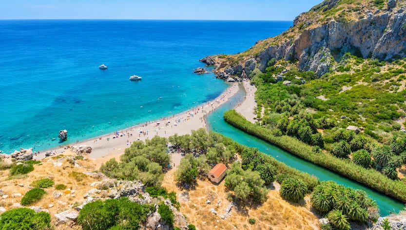 Preveli Palm Beach lagoon with turquoise waters and natural palm trees